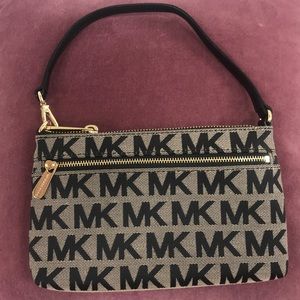 Michael Kors nude and black wristlet